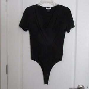 stay-tucked surplus top bodysuit